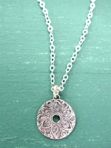 Small silver mandala necklace