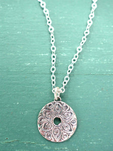 Small silver mandala necklace